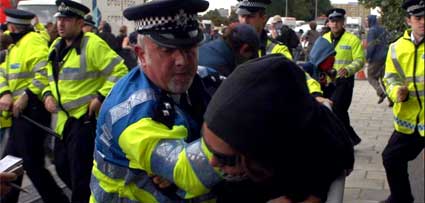 Mass arrests at the Defences Systems and Equipment International arms fair (DSEi) protests in Docklands, London, September 2003
